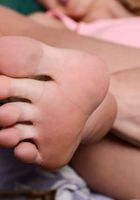 Emma Hix bites her toes., Emma Hix (emm032) ATK Petites: Emma Hix (Emma Hix bites her toes.)