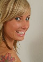 ATK Archives: Natalie (Naughty coed Natalie teases with her panties and shaved pussy)